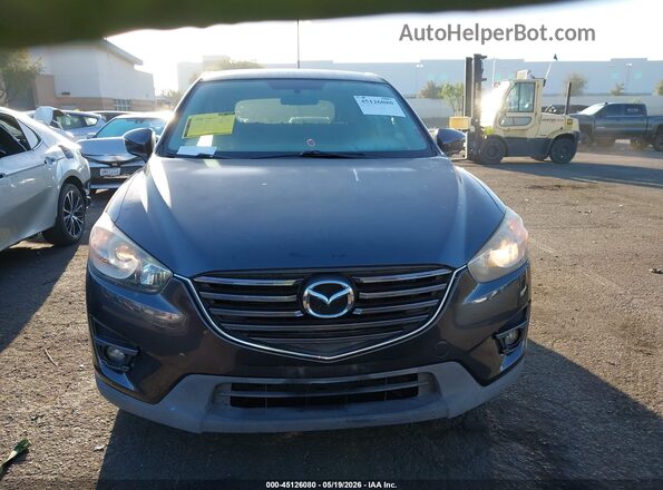 JM3KE2CYXG0633792 2016 MAZDA CX-5 Серый Вид задней части салона