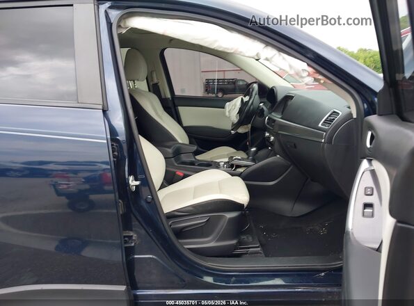 JM3KE2DY2G0730774 2016 MAZDA CX-5 Синий Вид салона спереди