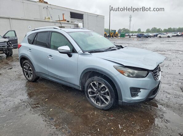 JM3KE2DY5G0789172 2016 MAZDA CX-5 Серебряный Передняя правая четверть