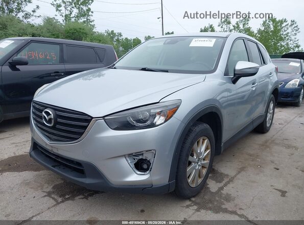 JM3KE4CY4G0640975 2016 MAZDA CX-5 Серебряный Передняя левая четверть