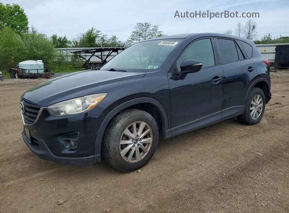 JM3KE4CYXG0617653 2016 MAZDA CX-5 Черный Передняя левая четверть