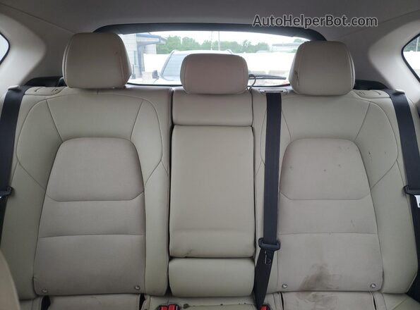 JM3KFACM7M1332052 2021 MAZDA CX-5 Red Vista de los asientos traseros