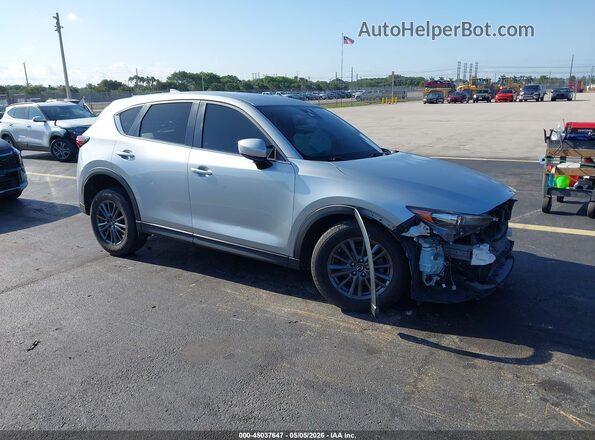 JM3KFACMXK0610431 2019 MAZDA CX-5 Серебряный Передняя правая четверть