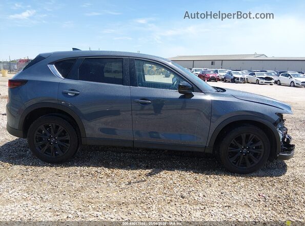 JM3KFBCM6N1543301 2022 MAZDA CX-5 Серый Вид задней части салона