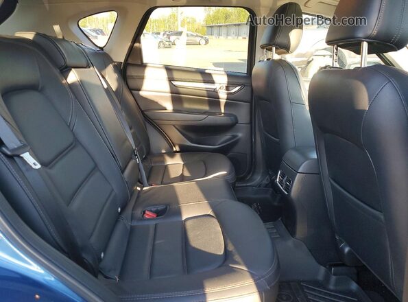 JM3KFBCM8P0221977 2023 MAZDA CX-5 Blue Vista interior trasera