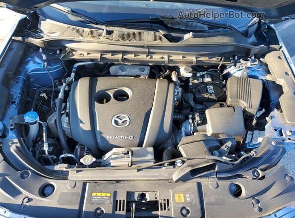 JM3KFBCM8P0221977 2023 MAZDA CX-5 Blue Vista del compartimento del motor