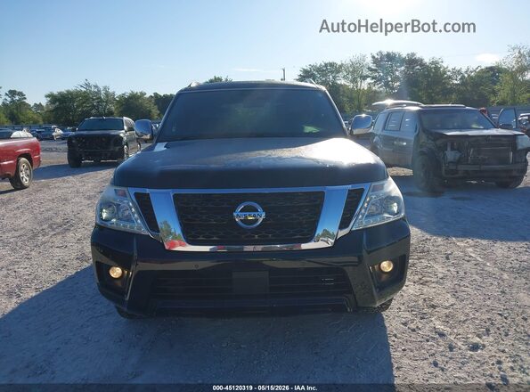JN8AY2NF6J9333035 2018 NISSAN ARMADA Black Vista interior trasera