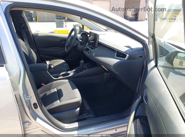 JTDB4MEE3S3032046 2025 TOYOTA COROLLA Silver წინა სალონის ხედი