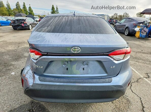 JTDB4MEE6P3010517 2023 TOYOTA COROLLA Серый Вид сзади