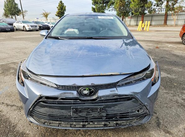 JTDB4MEE6P3010517 2023 TOYOTA COROLLA Серый Вид спереди