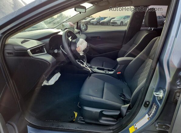 JTDB4MEE6P3010517 2023 TOYOTA COROLLA Серый Вид салона спереди