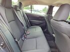 2026 Toyota Corolla Hybrid Le Gray vin: JTDBCMFE0T3124802
