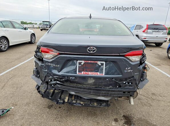 JTDBCMFE0T3124802 2026 TOYOTA COROLLA Gray Вид ззаду