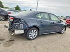 2026 Toyota Corolla Hybrid Le Gray vin: JTDBCMFE0T3124802