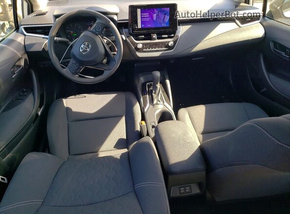 JTDBCMFE2R3065633 2024 TOYOTA COROLLA Серый Вид панели приборов