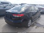 2024 Toyota Corolla Hybrid Le Black vin: JTDBCMFE2RJ020137