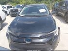 2024 Toyota Corolla Hybrid Le Black vin: JTDBCMFE2RJ020137