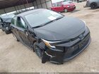 2025 Toyota Corolla Hybrid Le Black vin: JTDBCMFE2S3069137