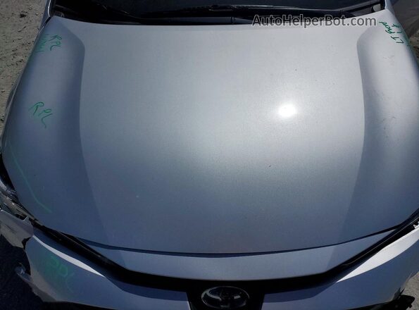 JTDBCMFE2S3099934 2025 TOYOTA COROLLA Серебряный Вид задней части салона