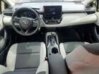 2026 Toyota Corolla Hybrid Le Black vin: JTDBCMFE2T3117883