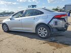 2025 Toyota Corolla Hybrid Le Silver vin: JTDBCMFE4S3099062