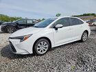 2025 Toyota Corolla Hybrid Le White vin: JTDBCMFE6S3072185