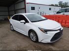 2025 Toyota Corolla Hybrid Le White vin: JTDBCMFE6S3081064