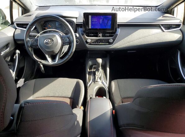 JTDBCMFE7R3034197 2024 TOYOTA COROLLA Белый Вид панели приборов