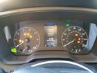 2025 Toyota Corolla Hybrid Le Black vin: JTDBCMFE7S3098407
