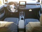 2025 Toyota Corolla Hybrid Le Black vin: JTDBCMFE7S3098407