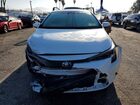 2024 Toyota Corolla Hybrid Le White vin: JTDBCMFE8R3063448