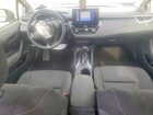 2024 Toyota Corolla Hybrid Le Silver vin: JTDBCMFE9R3028515