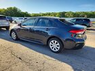 2026 Toyota Corolla Hybrid Le Серый vin: JTDBCMFE9T3133885