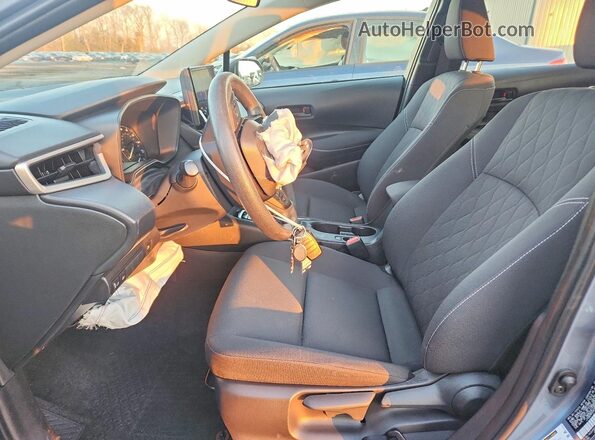 JTDBCMFEXP3006780 2023 TOYOTA COROLLA Silver Front interior view