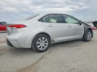 2025 Toyota Corolla Hybrid Le Silver vin: JTDBCMFEXS3092536