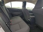 2025 Toyota Corolla Hybrid Le Silver vin: JTDBCMFEXS3092536