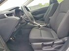 2025 Toyota Corolla Hybrid Le Silver vin: JTDBCMFEXS3092536