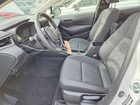 2025 Toyota Corolla Hybrid Le Белый vin: JTDBDMHE1S3026337