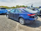 2026 Toyota Corolla Hybrid Le Blue vin: JTDBDMHE1T3029952