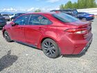 2026 Toyota Corolla Hybrid Se Red vin: JTDBDMHE6T3029056