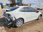 2023 Toyota Corolla Hybrid Le White vin: JTDBDMHEXP3006742