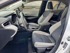 2023 Toyota Corolla Hybrid Le White vin: JTDBDMHEXP3006742
