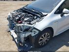 2021 Toyota Corolla Hybrid Le Белый vin: JTDEAMDEXMJ014262