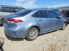 2021 Toyota Corolla Hybrid Le Blue vin: JTDEAMDEXMJ025763