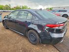 2022 Toyota Corolla Le Black vin: JTDEPMAE9NJ209693