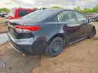 2022 Toyota Corolla Le Black vin: JTDEPMAE9NJ209693