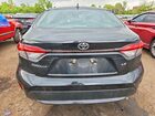 2022 Toyota Corolla Le Black vin: JTDEPMAE9NJ209693