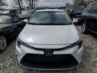 2020 Toyota Corolla Le White vin: JTDEPRAEXLJ005950