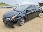 2021 Toyota Prius L Eco Black vin: JTDKAMFU1M3141090