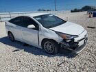 2021 Toyota Prius Le Белый vin: JTDKAMFU4M3140192